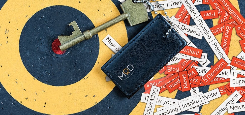 a target with a key pointing towards the middle