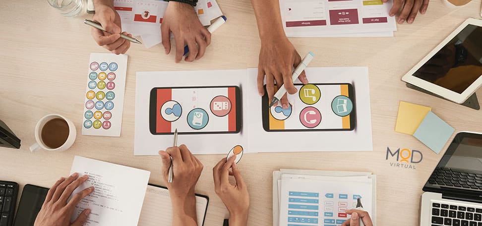 group of social media marketers working together at a table