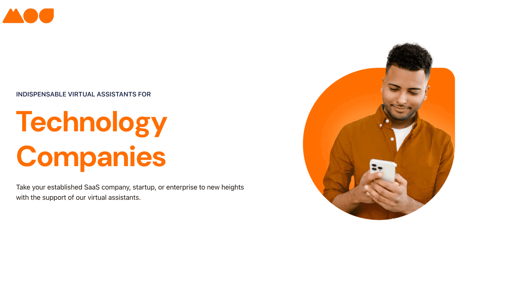 A man in an orange shirt looks at his phone, smiling, on a white background. Text reads: Indispensable Virtual Assistants for Technology Companies. Take your established SaaS company, startup, or enterprise to new heights with our support.