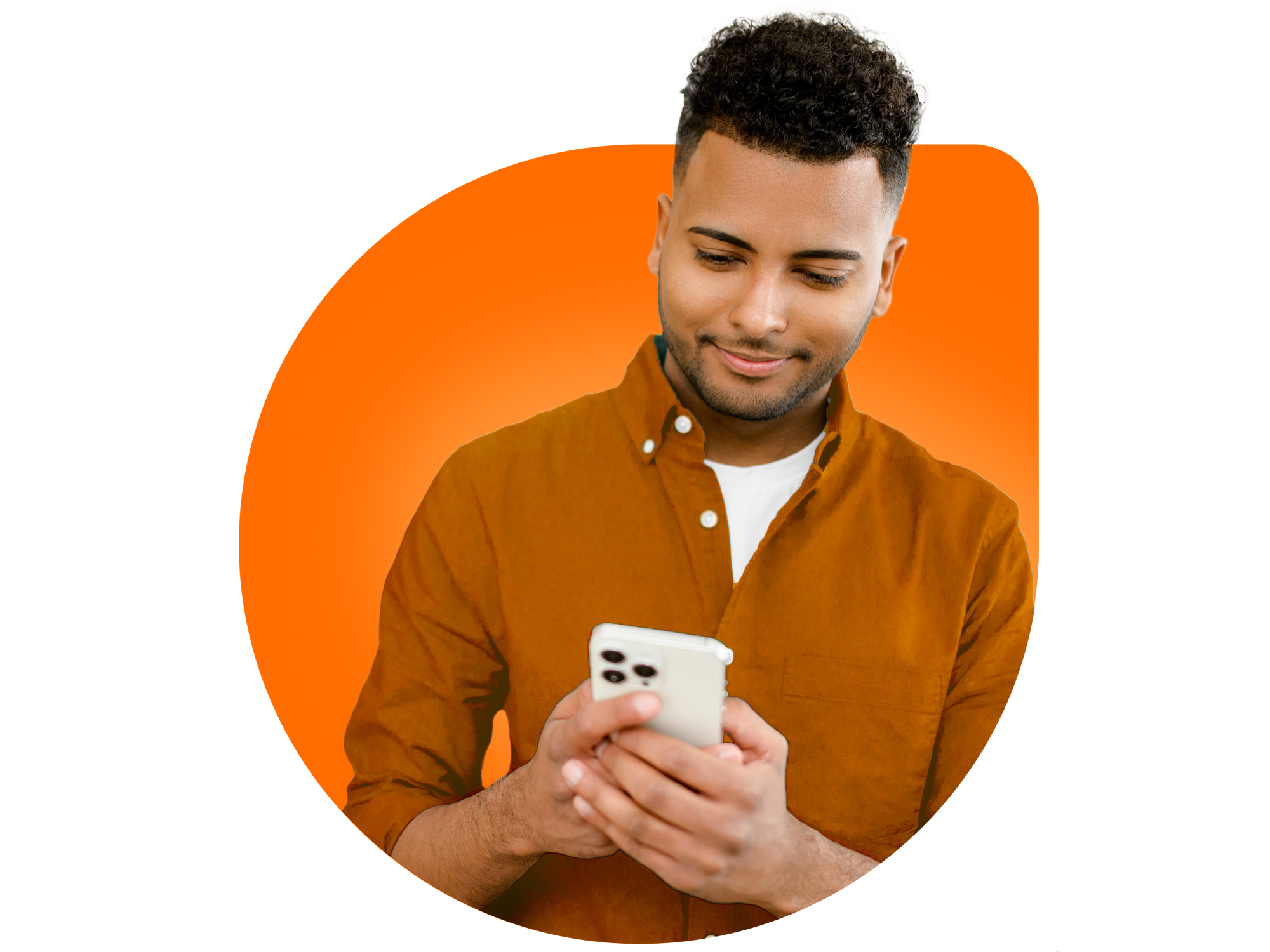 Young man looking at his phone, smiling.